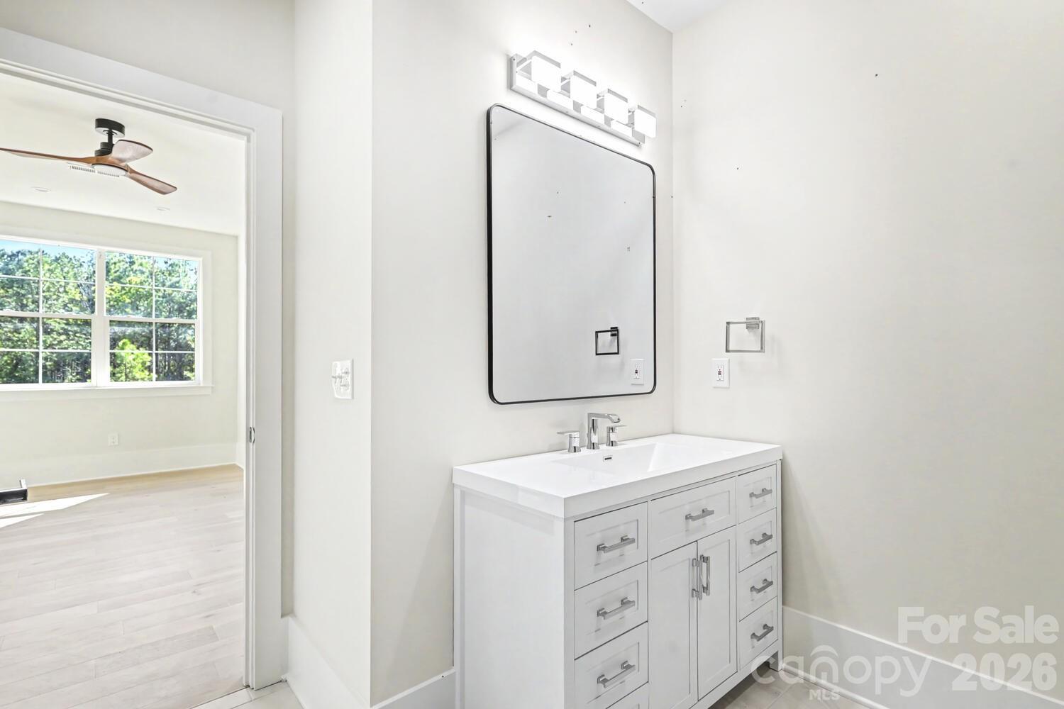 3210 Sherman Drive Lancaster, SC 29720 - Photo 35 of 44 a bathroom with a sink mirror and double