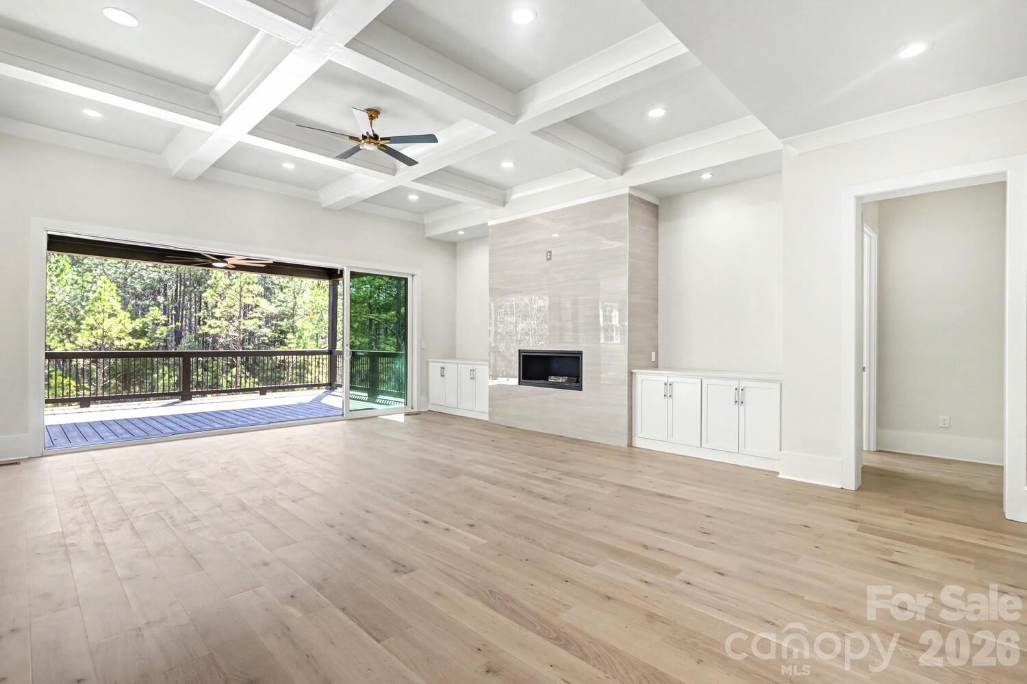 3210 Sherman Drive Lancaster, SC 29720 - Photo 4 of 44 an empty room with windows and fireplace
