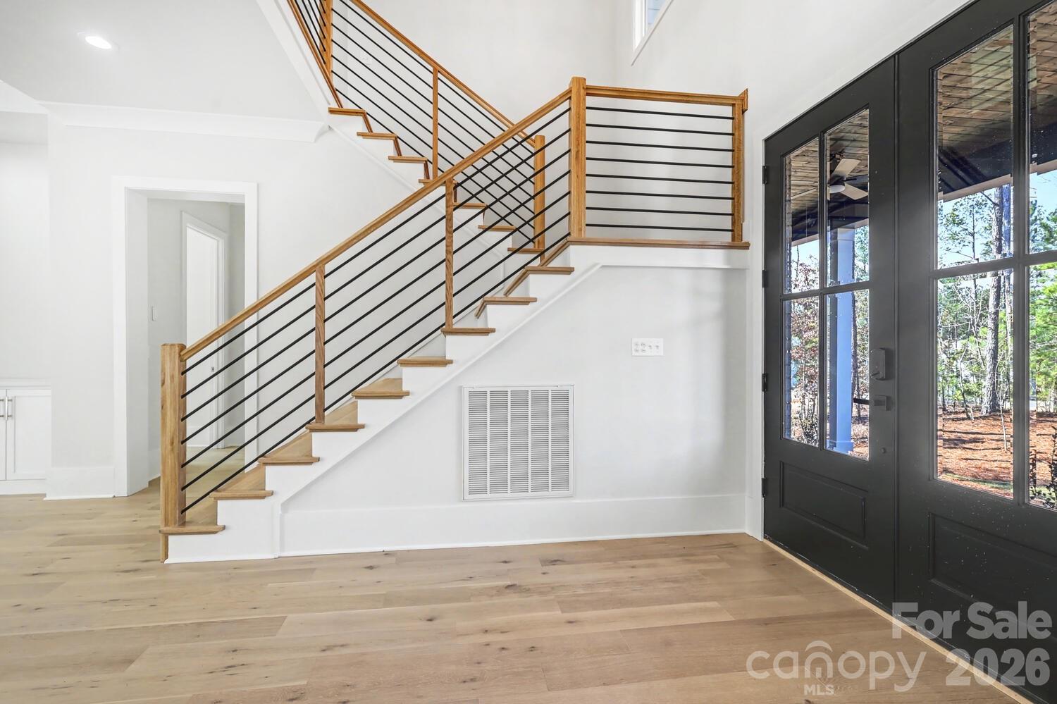 3210 Sherman Drive Lancaster, SC 29720 - Photo 9 of 44 a view of entryway and hall with wooden floor