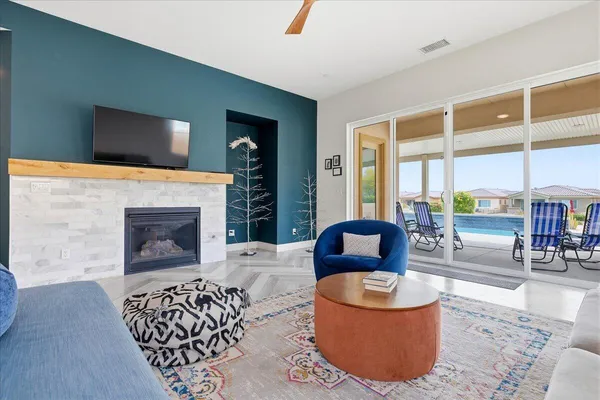 a living room with furniture and a window