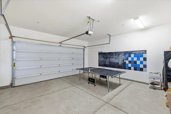 a view of a sink and washer dryer