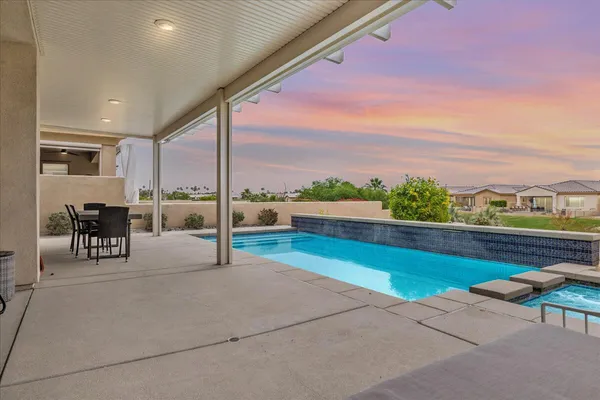 a view of outdoor space with seating area