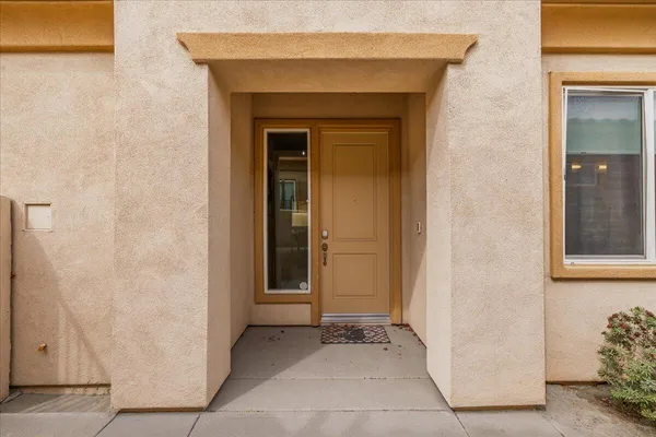 a entryway with flower pots