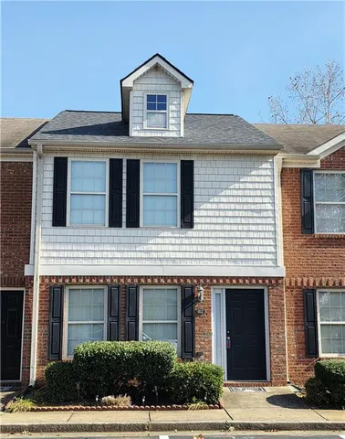 a house view with a outdoor space