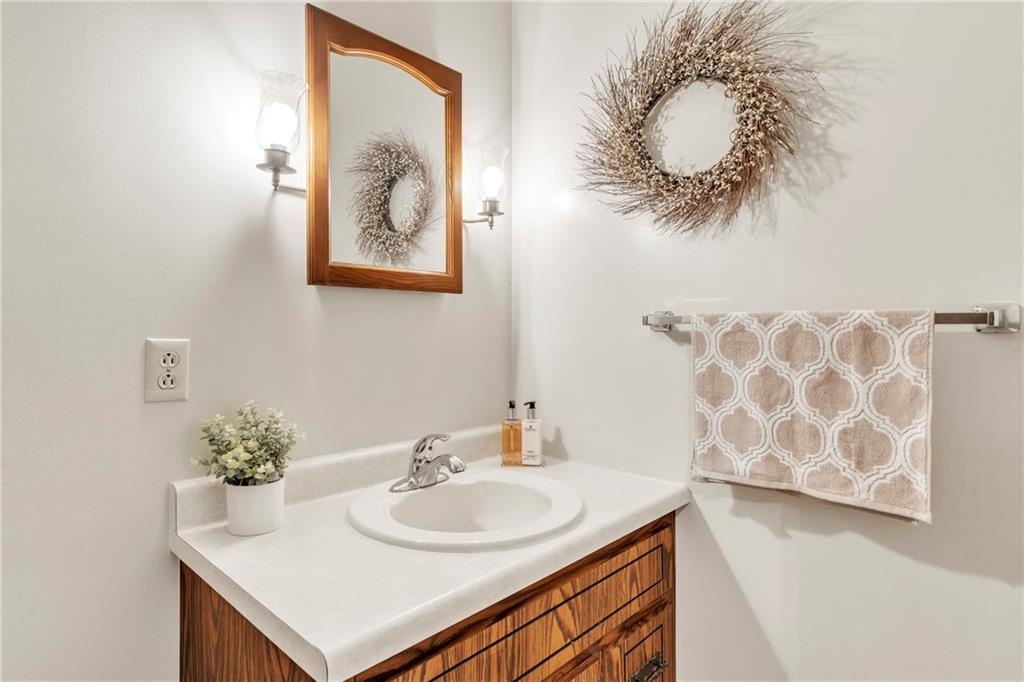 454 Cherokee Drive Butler, PA 16001 - Photo 27 of 31 a bathroom with a sink and a mirror
