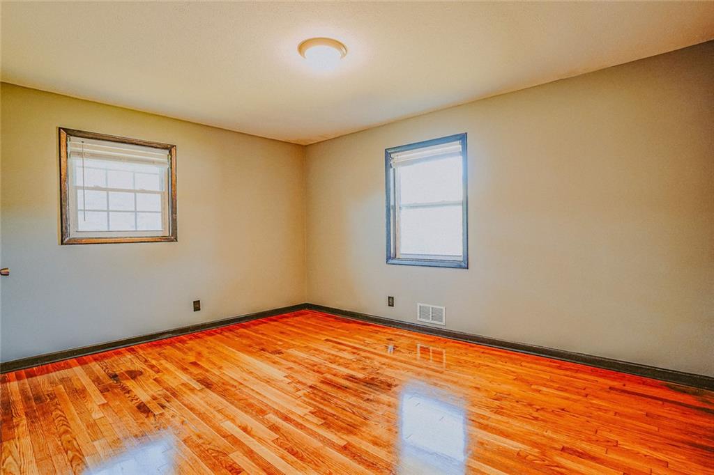 2877 Whispering Hills Drive, Unit 2875 Atlanta, GA 30341 - Photo 11 of 18 a view of empty room with window