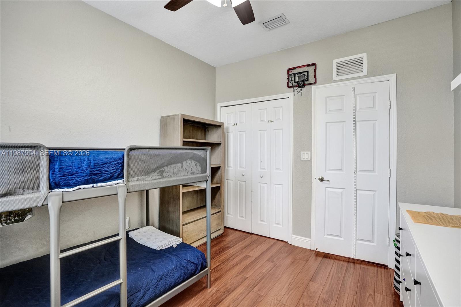 12554 Southwest 125th Terrace Miami, FL 33186 - Photo 27 of 41 a view of kitchen with wooden floor and electronic appliances