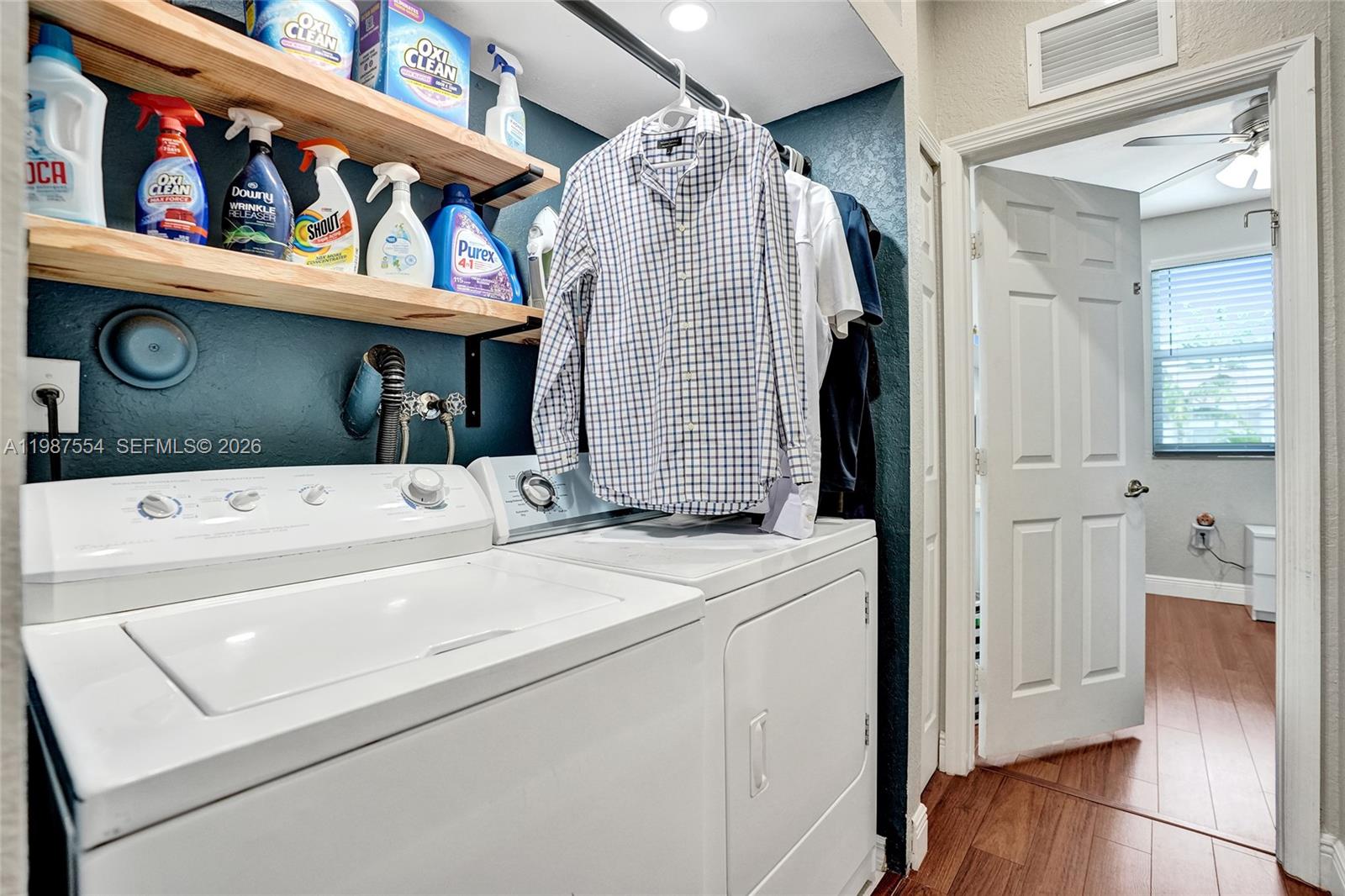 12554 Southwest 125th Terrace Miami, FL 33186 - Photo 31 of 41 a utility room with dryer and washer