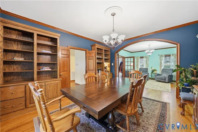 a spacious bathroom with a sink double vanity granite and a mirror