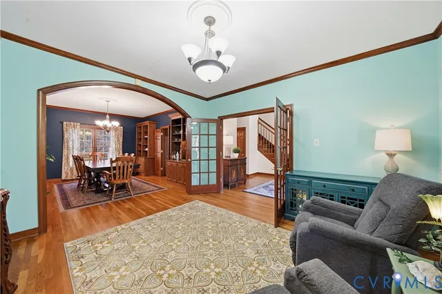 a bed room with a bed mirror and a window