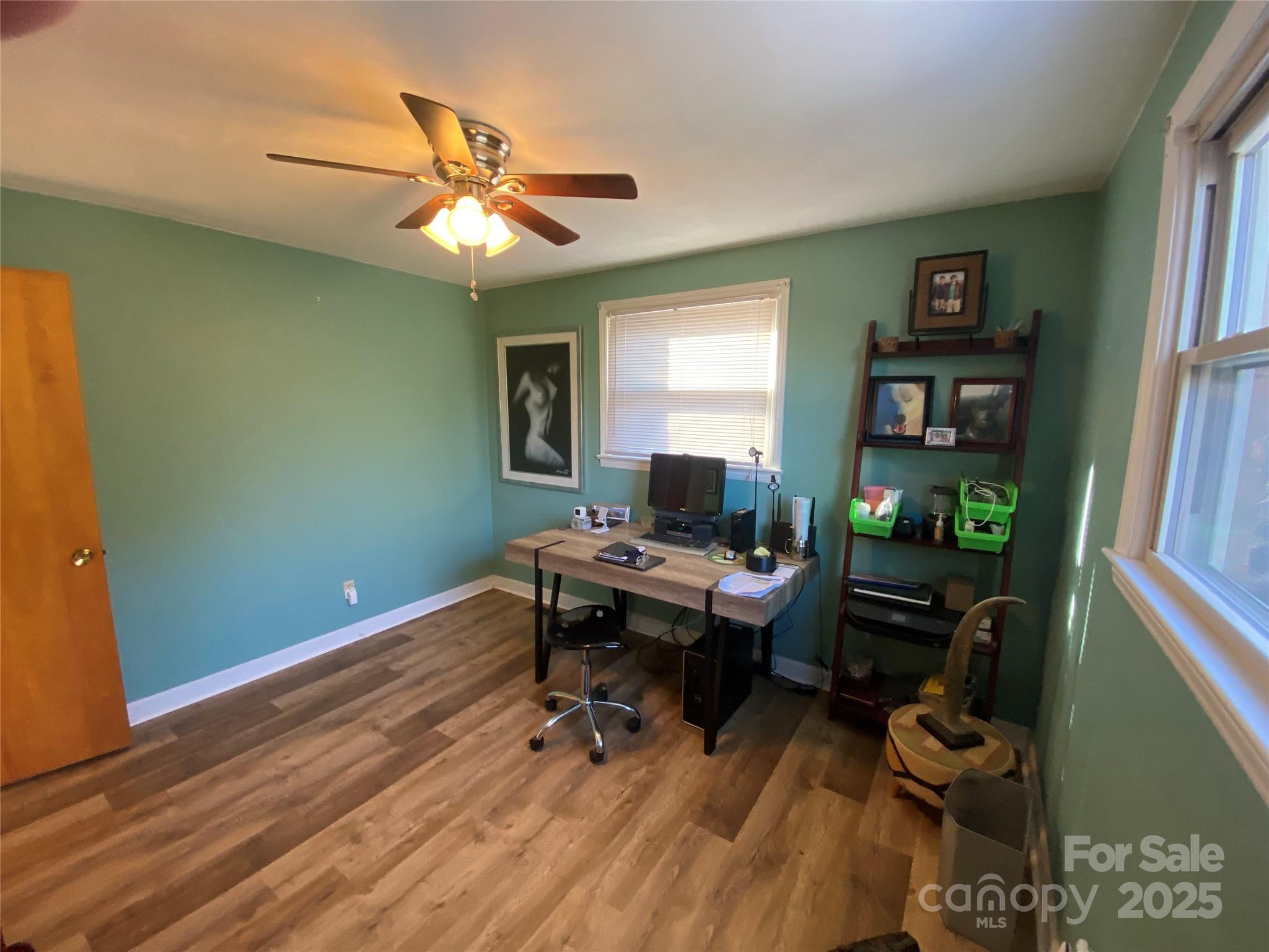 3262 Wilson Heights Drive Hildebran, NC 28637 - Photo 14 of 22 a workspace with wooden floor
