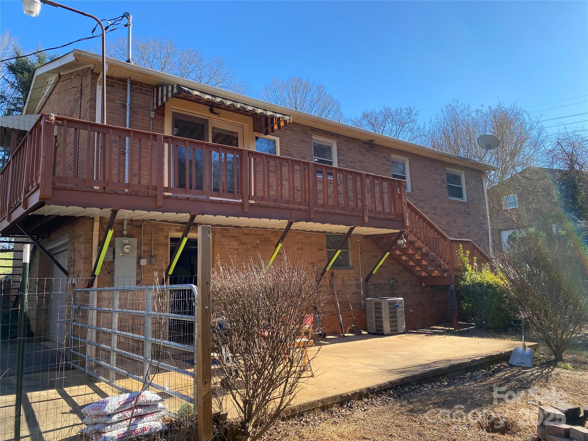 3262 Wilson Heights Drive Hildebran, NC 28637 - Photo 19 of 22 a view of a house with a garage