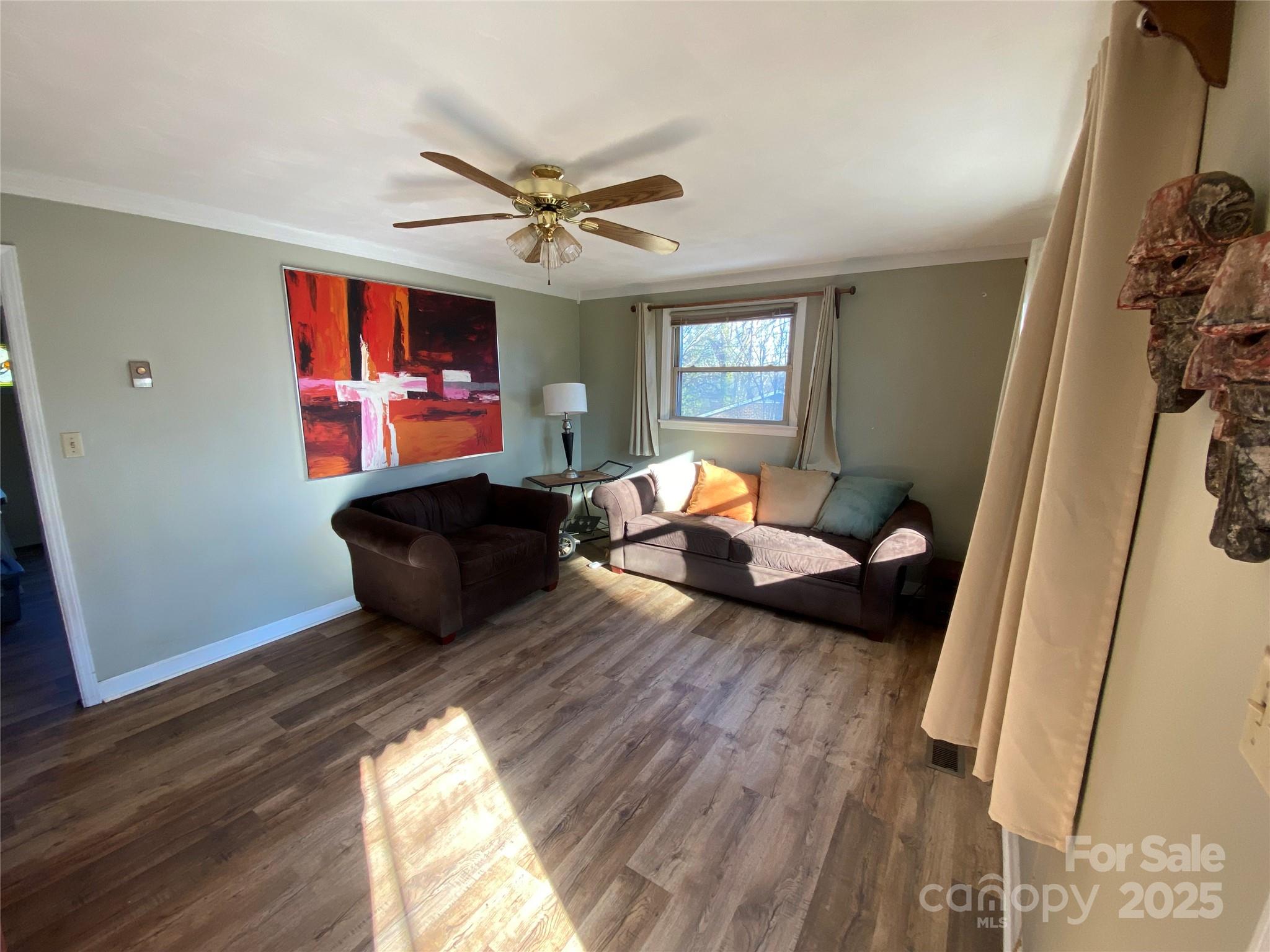 3262 Wilson Heights Drive Hildebran, NC 28637 - Photo 2 of 22 a living room with furniture and a window