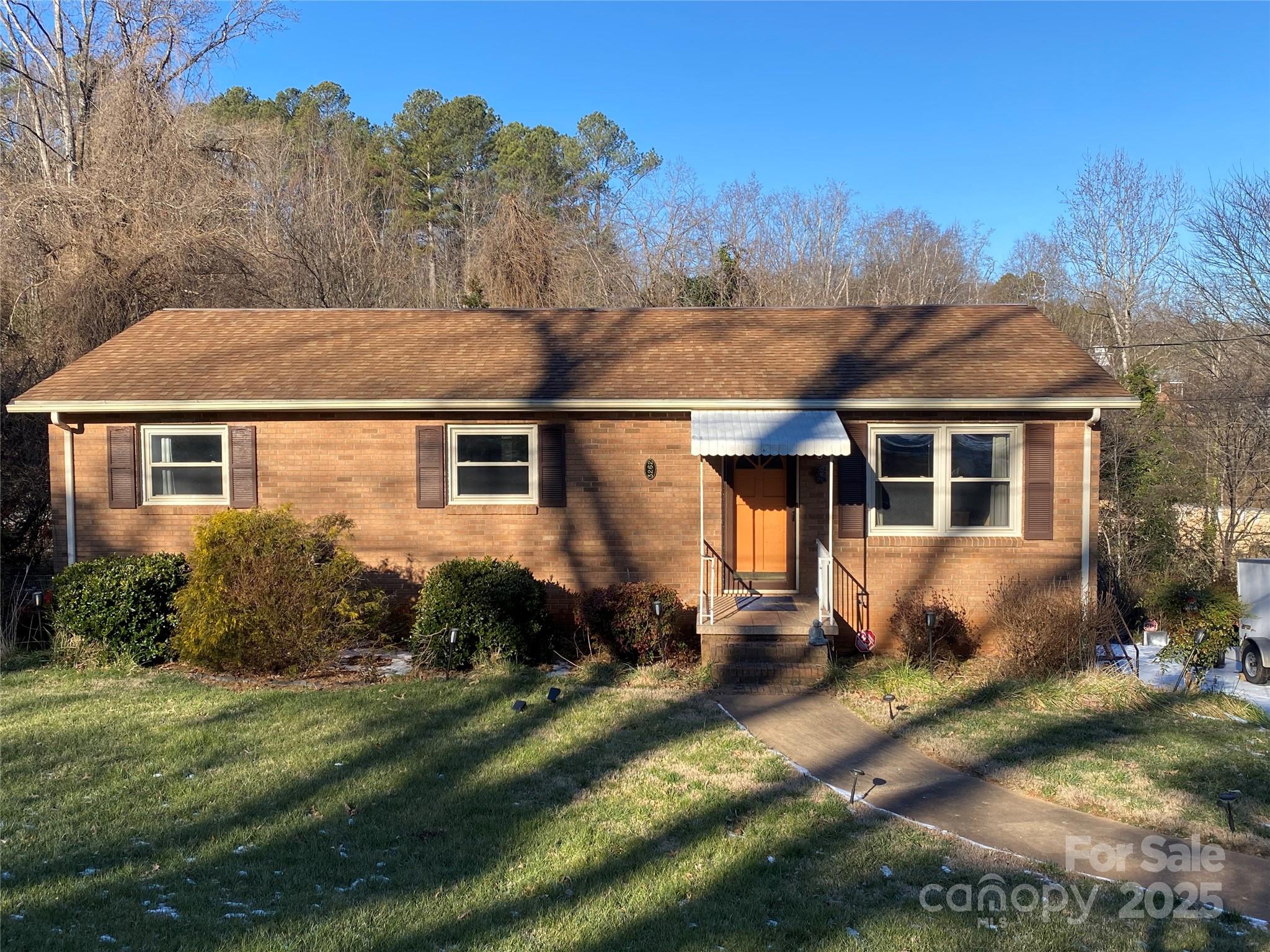 3262 Wilson Heights Drive Hildebran, NC 28637 - Photo 22 of 22 a front view of a house with a yard