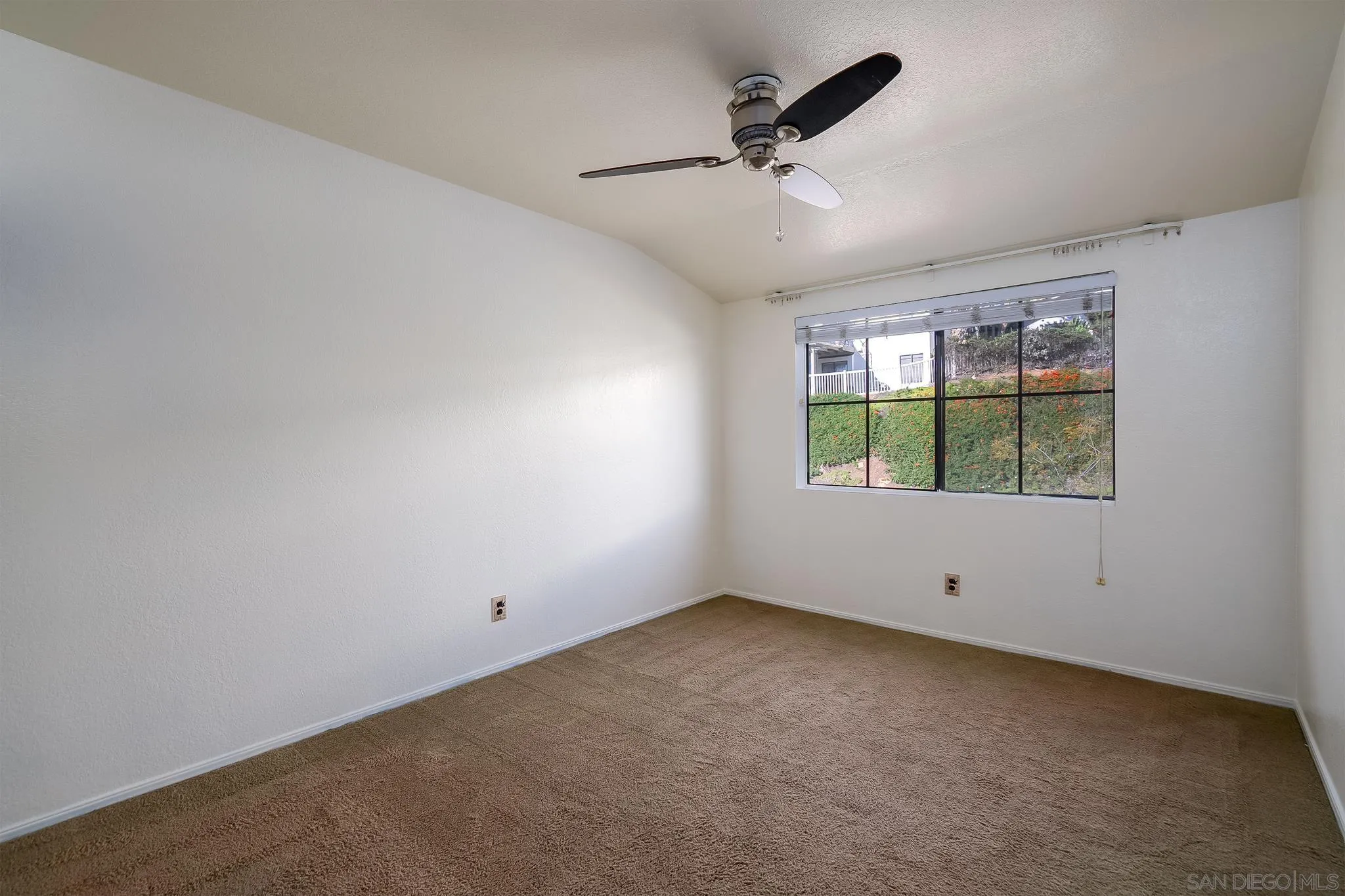 10137 Greenleaf Road Spring Valley, CA 91977 - Photo 26 of 58 an empty room with windows
