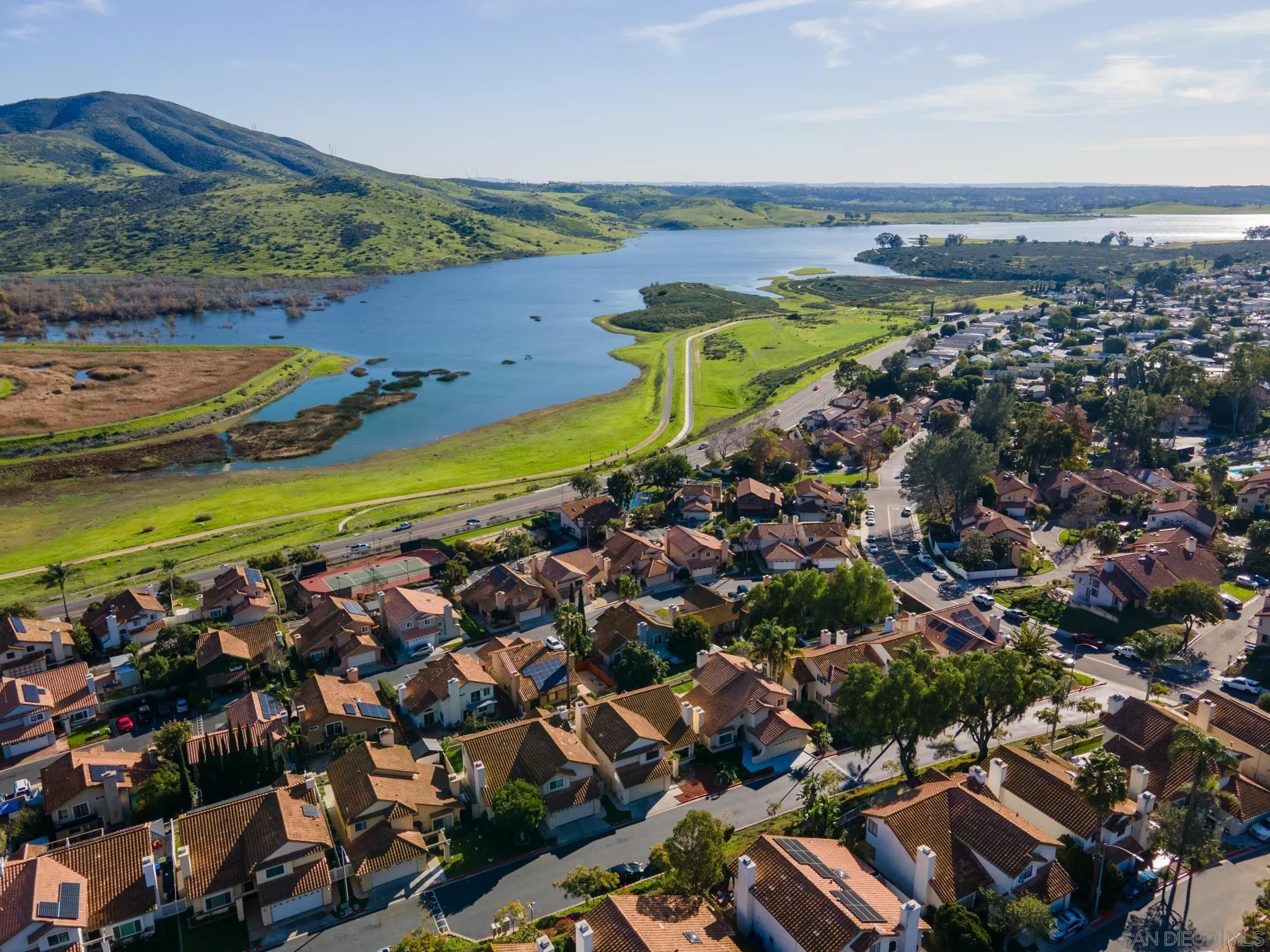 10137 Greenleaf Road Spring Valley, CA 91977 - Photo 50 of 58 an aerial view of a city with lots of residential buildings ocean and mountain view in back