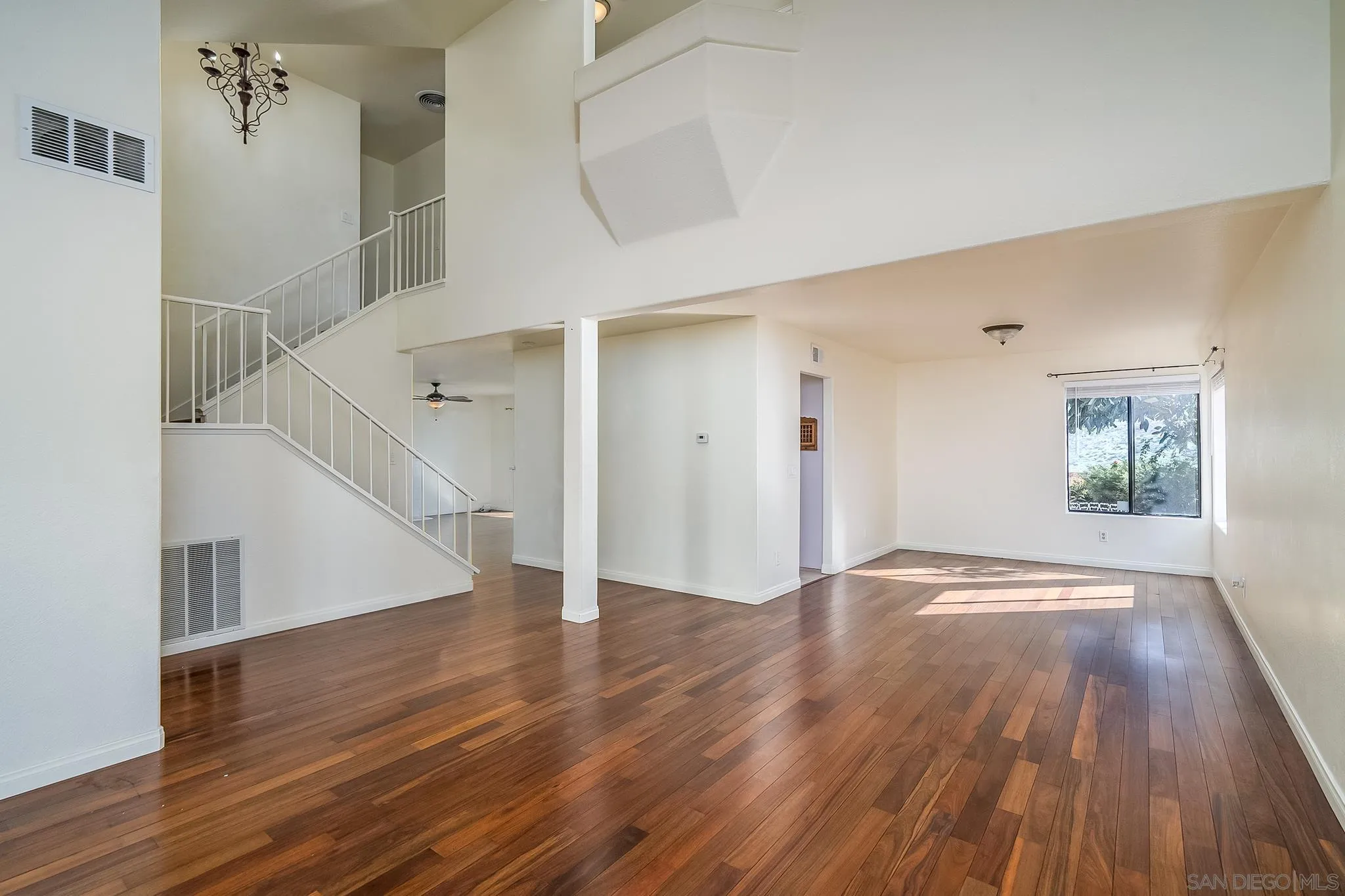 10137 Greenleaf Road Spring Valley, CA 91977 - Photo 6 of 58 a view of empty room with wooden floor