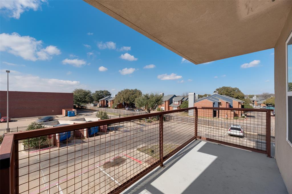 1100 West Trinity Mills Road, Unit 2040 Carrollton, TX 75006 - Photo 21 of 21 a view of a balcony with chairs