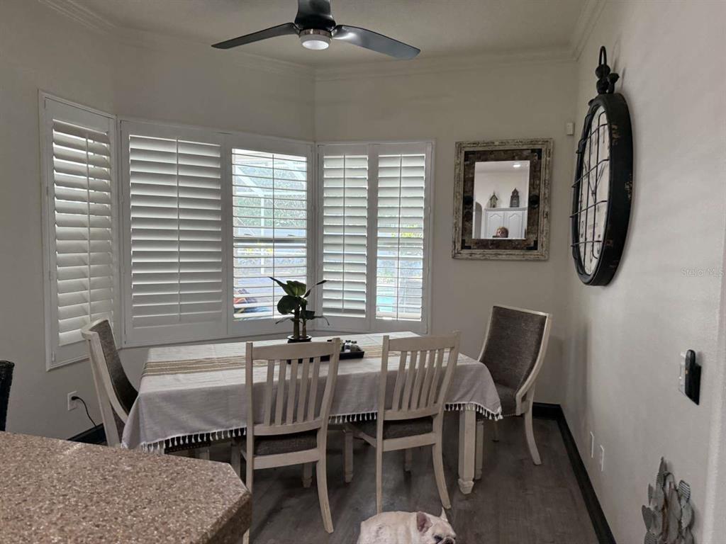 6568 Millstone Drive New Port Richey, FL 34655 - Photo 16 of 26 a dining room with furniture and window