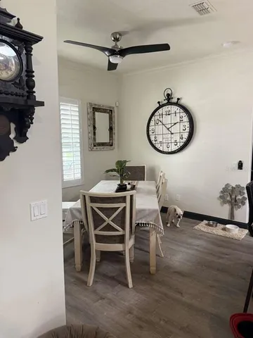 a view of a dining room with furniture