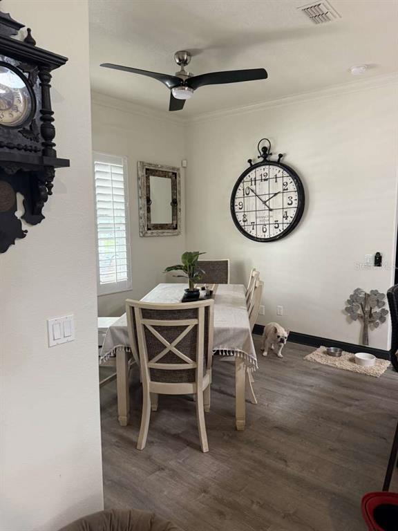 6568 Millstone Drive New Port Richey, FL 34655 - Photo 17 of 26 a view of a dining room with furniture