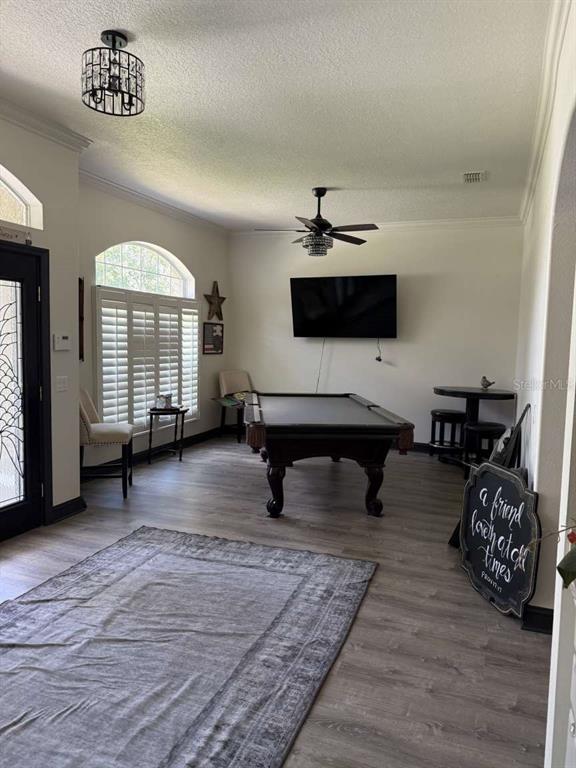6568 Millstone Drive New Port Richey, FL 34655 - Photo 5 of 26 a living room with furniture and a flat screen tv