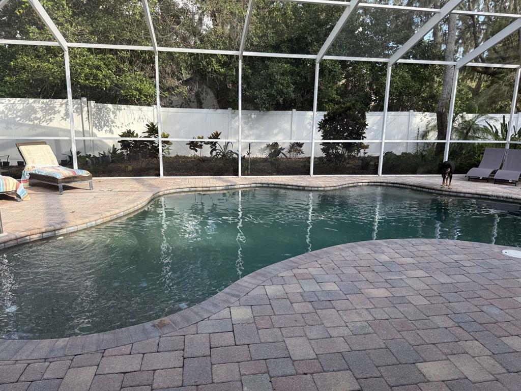 6568 Millstone Drive New Port Richey, FL 34655 - Photo 7 of 26 a view of a bathroom with a sink and wooden floor