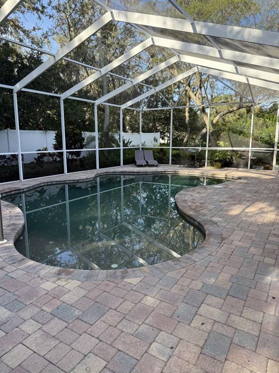 6568 Millstone Drive New Port Richey, FL 34655 - Photo 8 of 26 a view of a backyard
