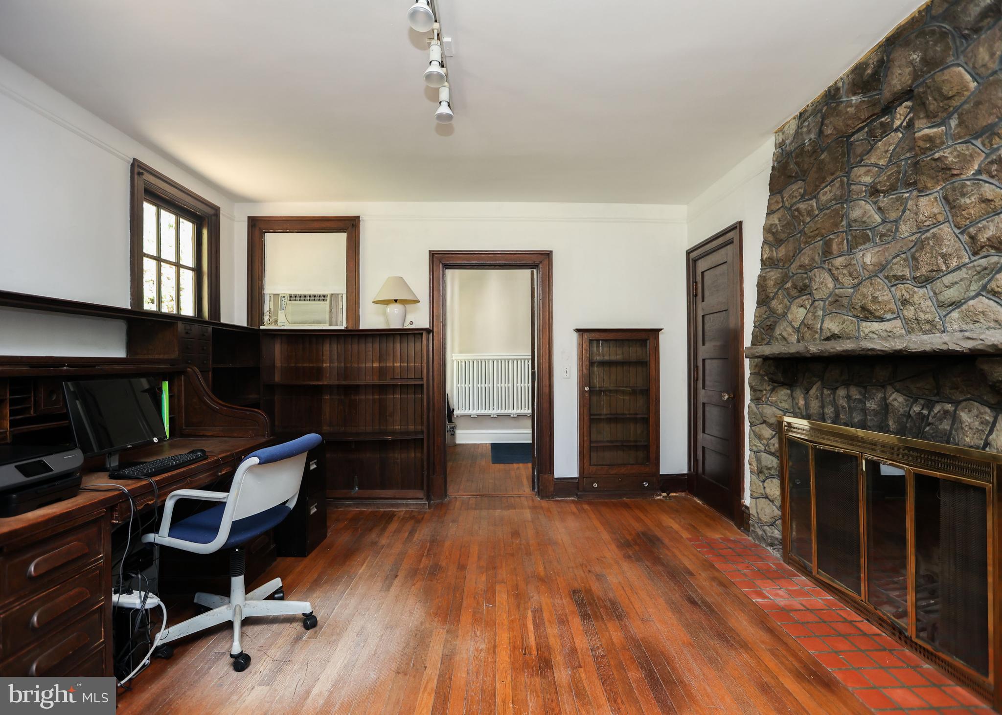 103 Edgevale Road Baltimore, MD 21210 - Photo 25 of 71 Stone wood burning fireplace