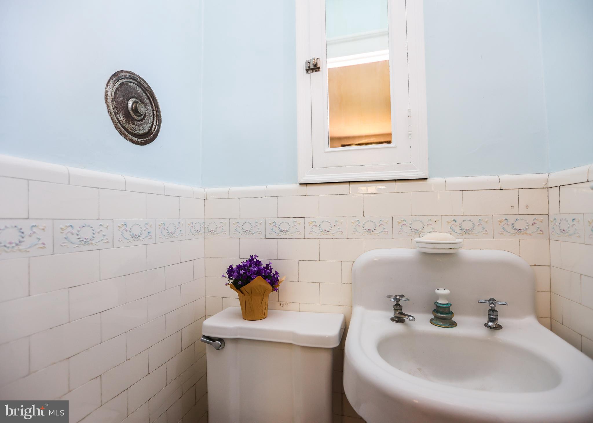 103 Edgevale Road Baltimore, MD 21210 - Photo 26 of 71 Powder room off office (with safe)