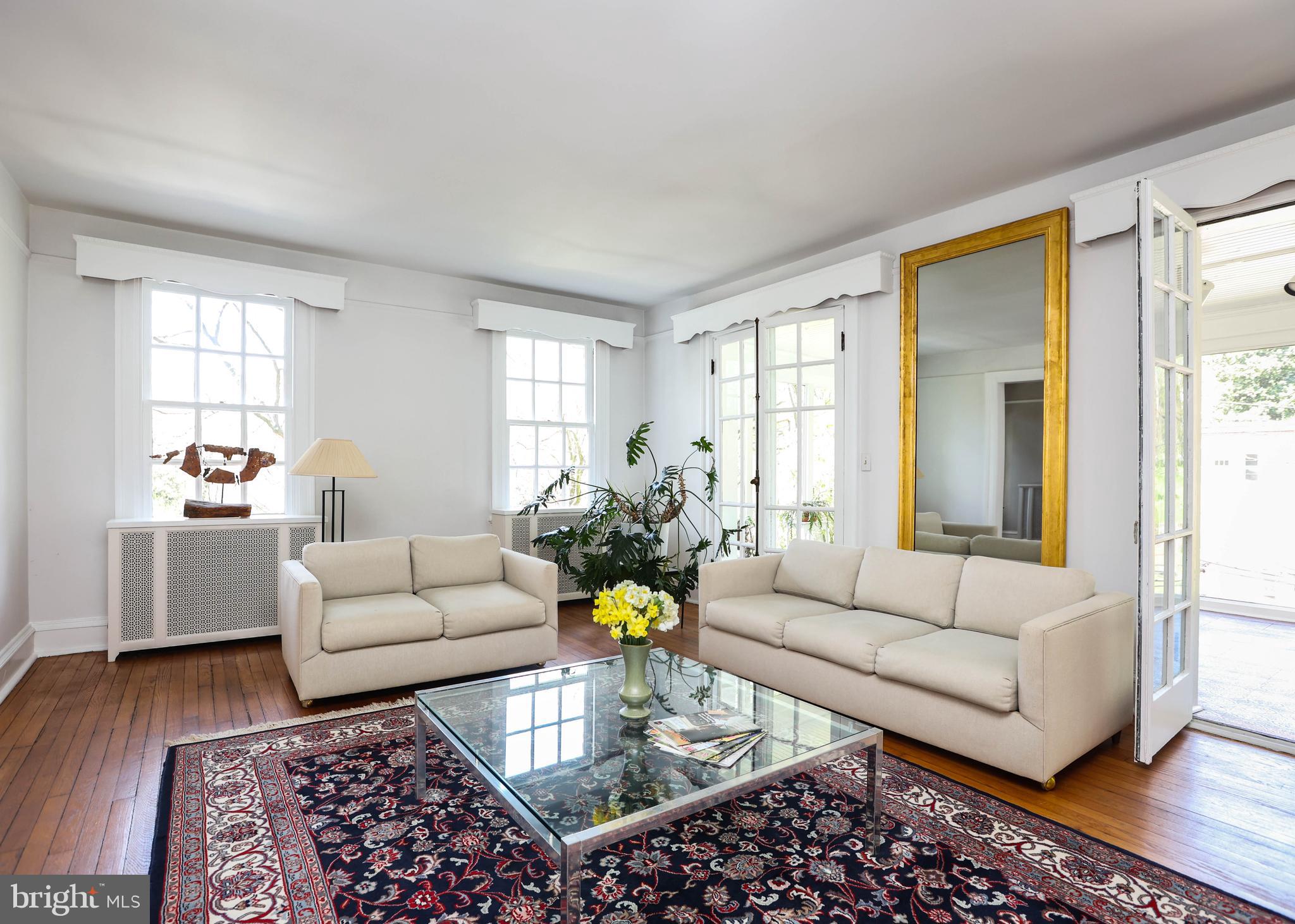 103 Edgevale Road Baltimore, MD 21210 - Photo 10 of 71 Elegant gilt pier mirror reflects light