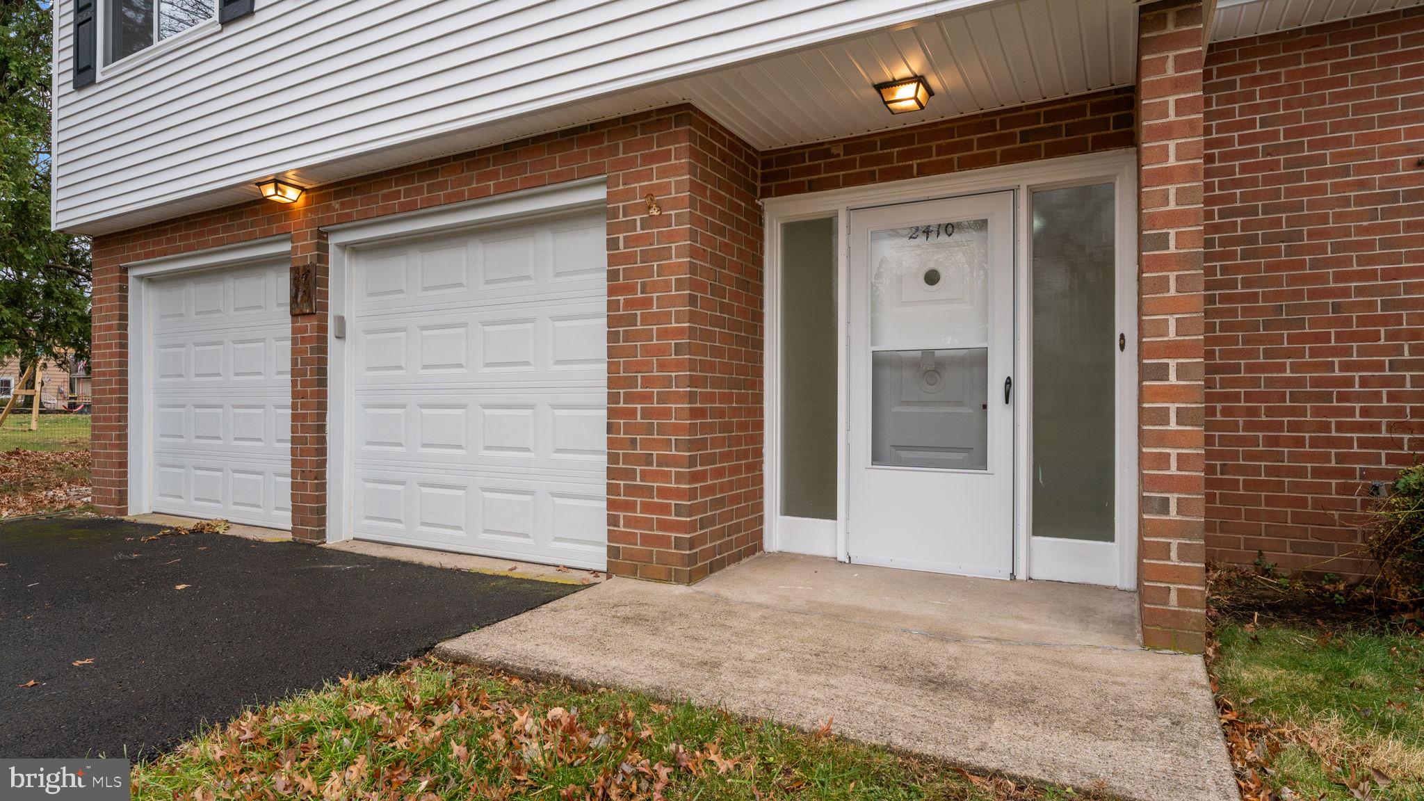 2410 Exton Road Hatboro, PA 19040 - Photo 3 of 63 a front view of a house with a yard