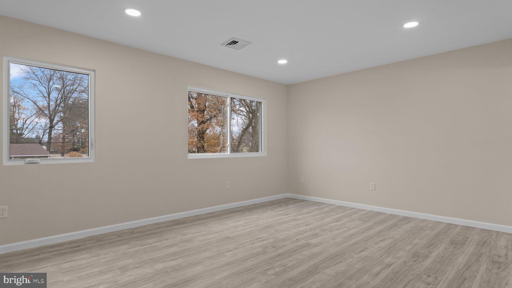 2410 Exton Road Hatboro, PA 19040 - Photo 39 of 63 a view of empty room with wooden floor and window