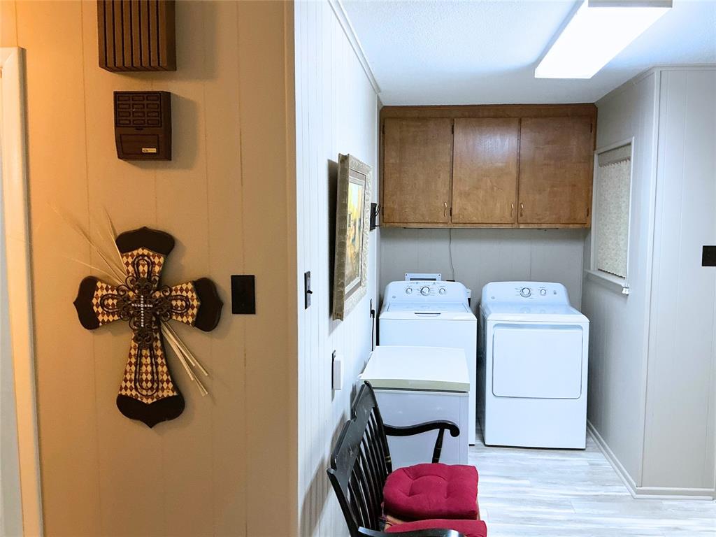 1818 Boot Hill Road Granbury, TX 76049 - Photo 15 of 23 a storage room with washer and dryer