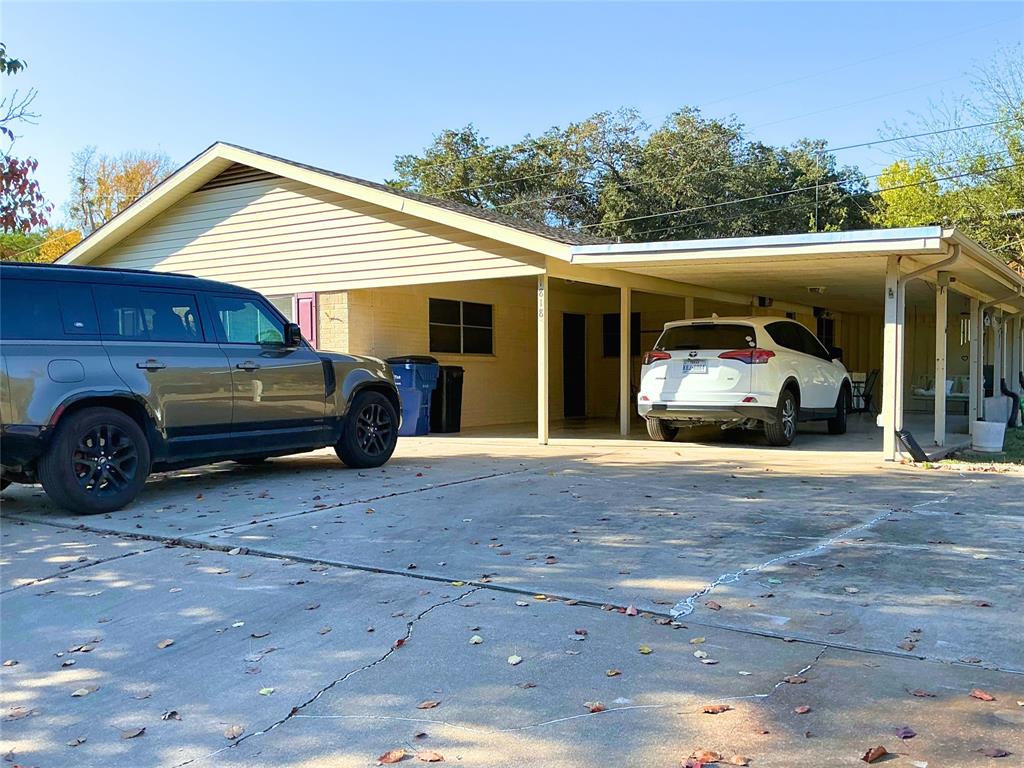 1818 Boot Hill Road Granbury, TX 76049 - Photo 17 of 23 a car parked in front of a house