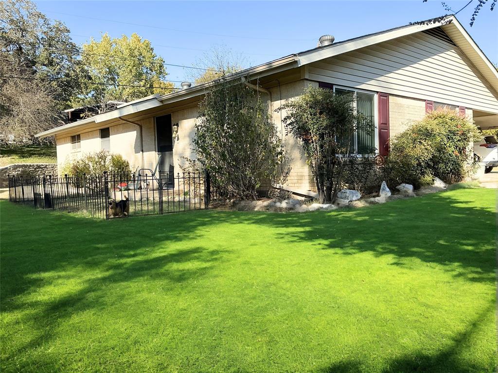 1818 Boot Hill Road Granbury, TX 76049 - Photo 20 of 23 a view of a house with backyard