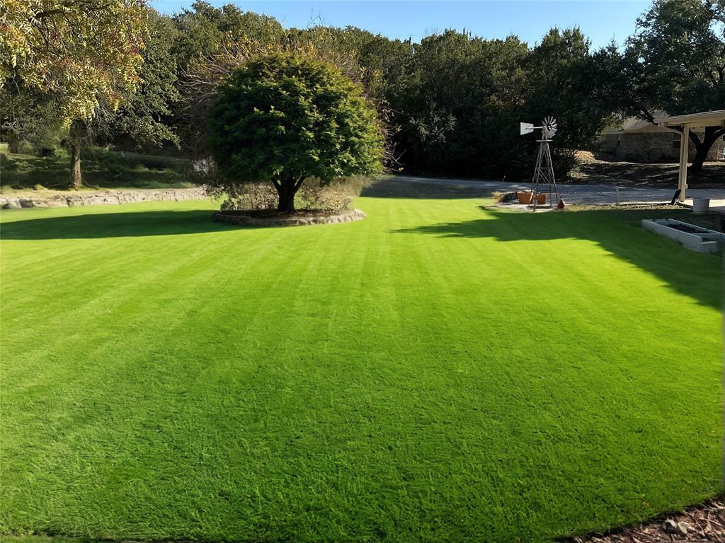 1818 Boot Hill Road Granbury, TX 76049 - Photo 21 of 23 a view of a park with large trees