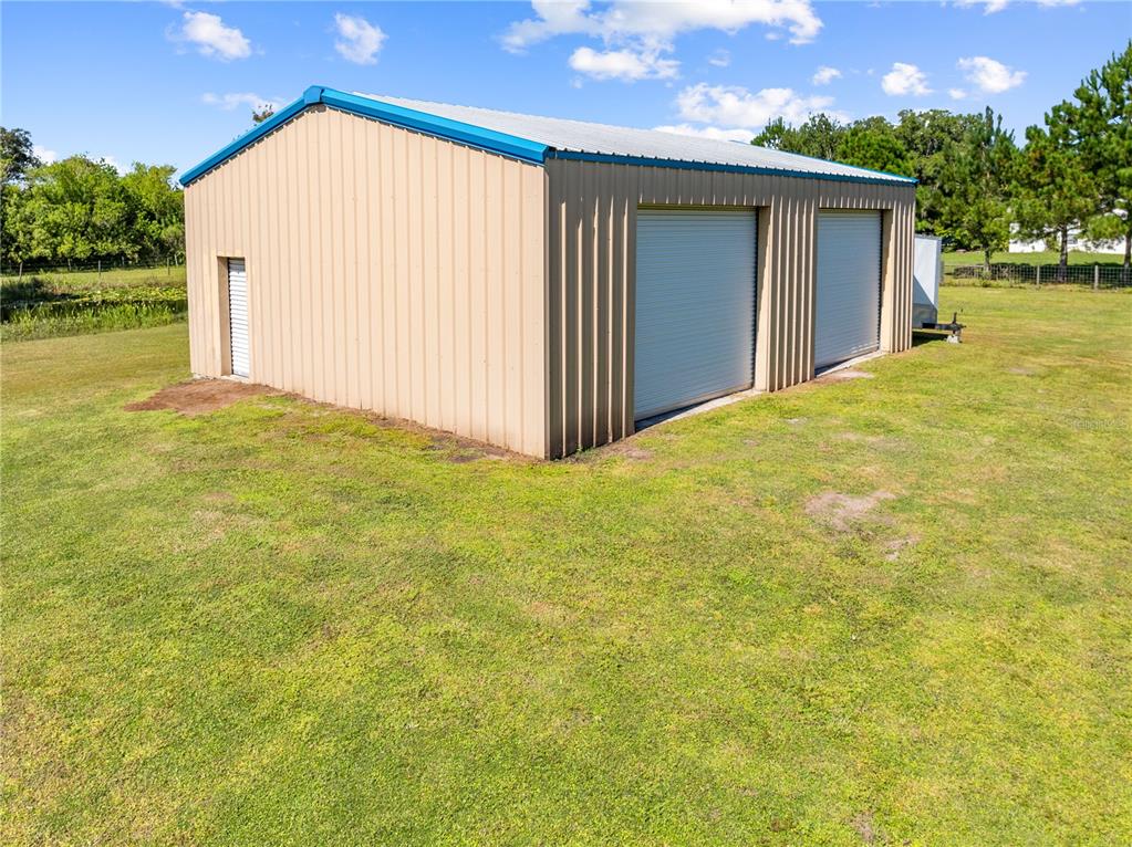 3198 Cherokee Road St. Cloud, FL 34772 - Photo 40 of 43 a view of backyard of a house