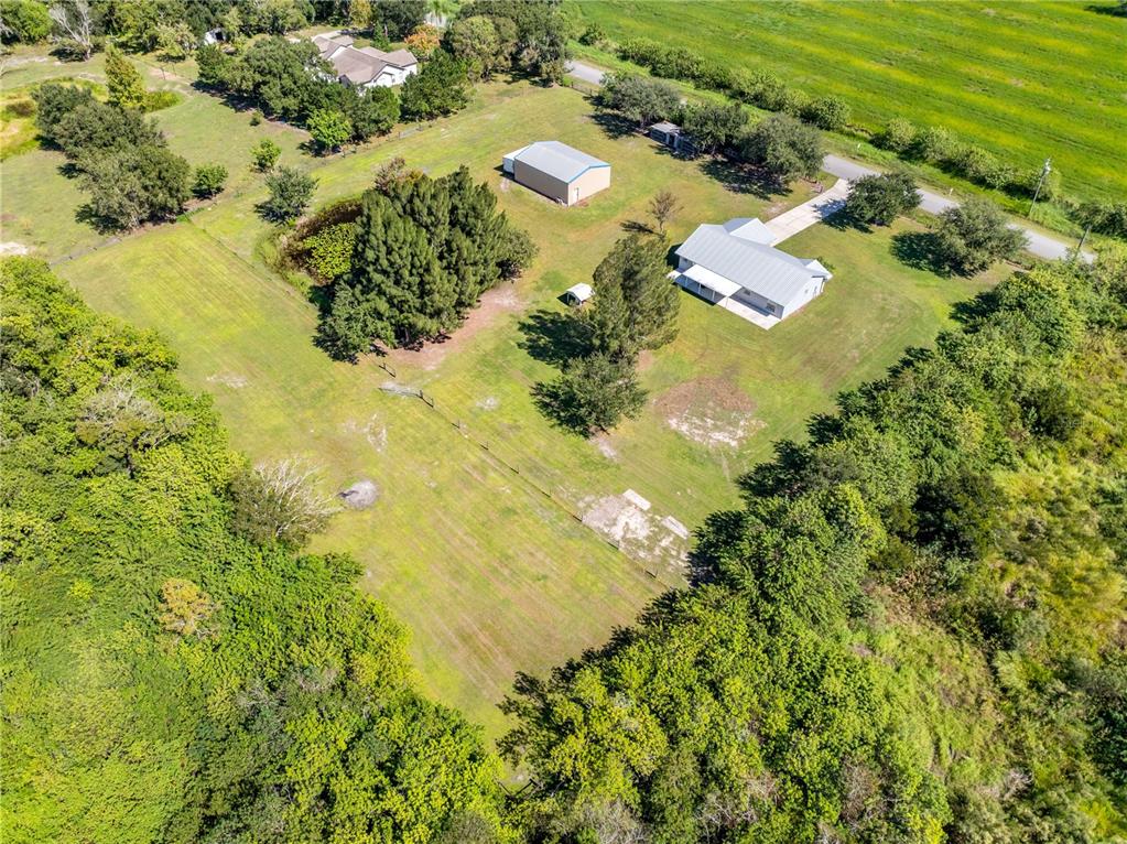 3198 Cherokee Road St. Cloud, FL 34772 - Photo 43 of 43 an aerial view of residential houses with swimming pool