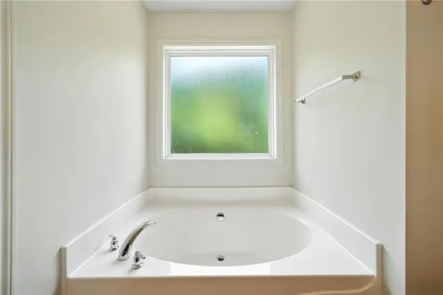 a bathroom with a bathtub