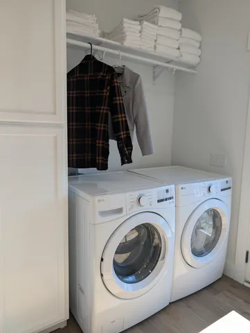 a utility room with dryer and washer