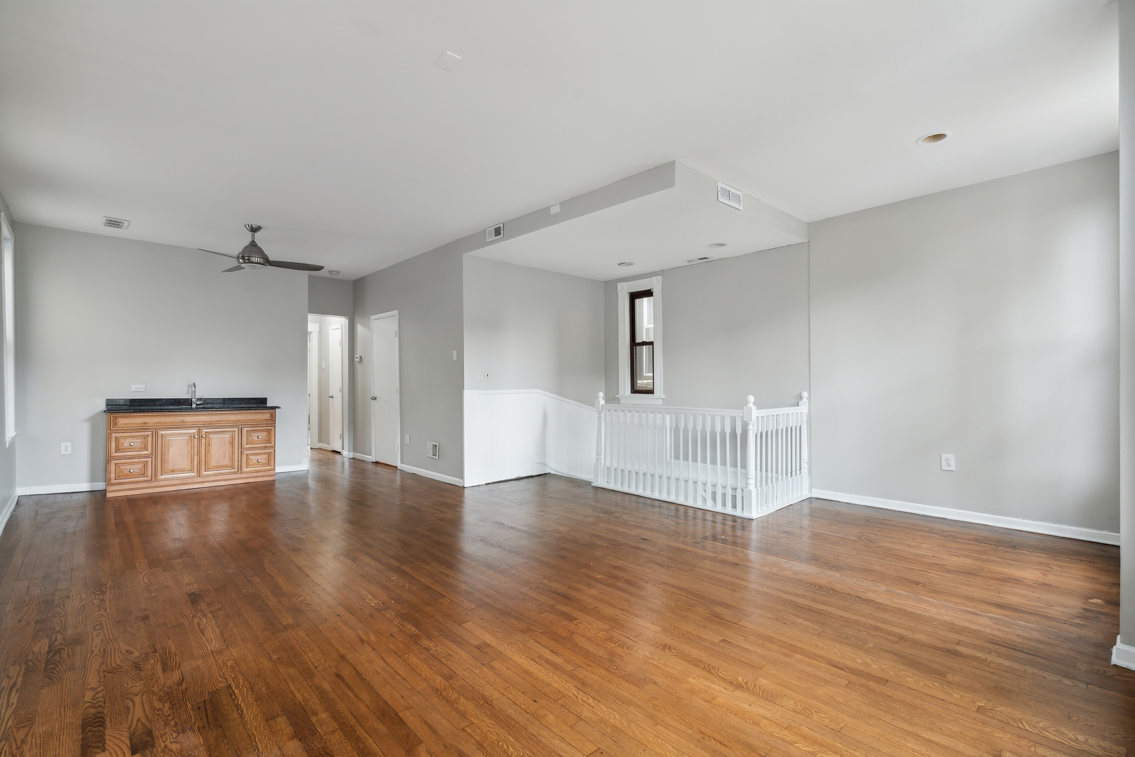 1439 West Lexington Street Chicago, IL 60607 - Photo 9 of 22 a view of empty room with wooden floor