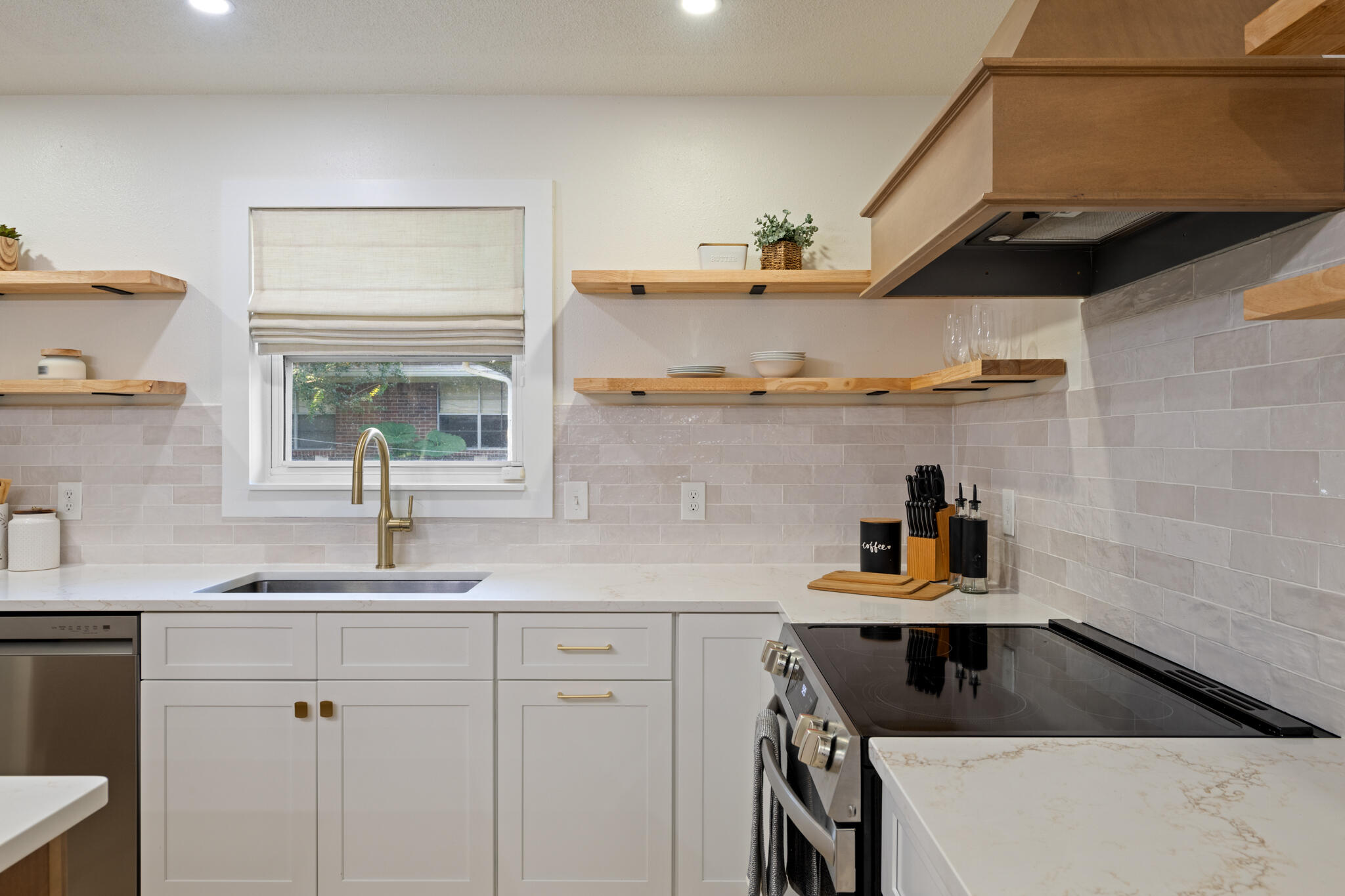 538 22nd Street Niceville, FL 32578 - Photo 1 of 46 a kitchen with cabinets and window