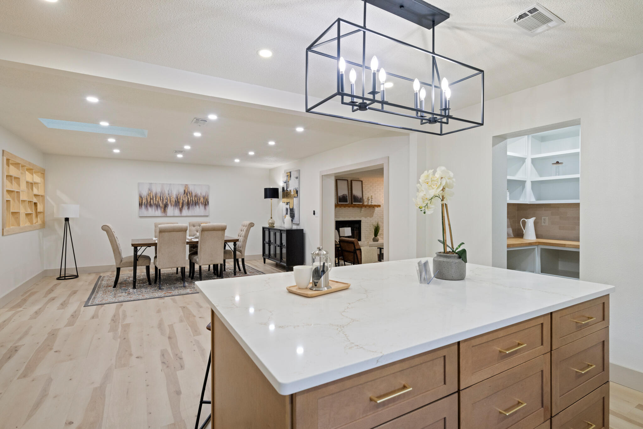 538 22nd Street Niceville, FL 32578 - Photo 16 of 46 a kitchen with stainless steel appliances kitchen island granite countertop a table and chairs in it