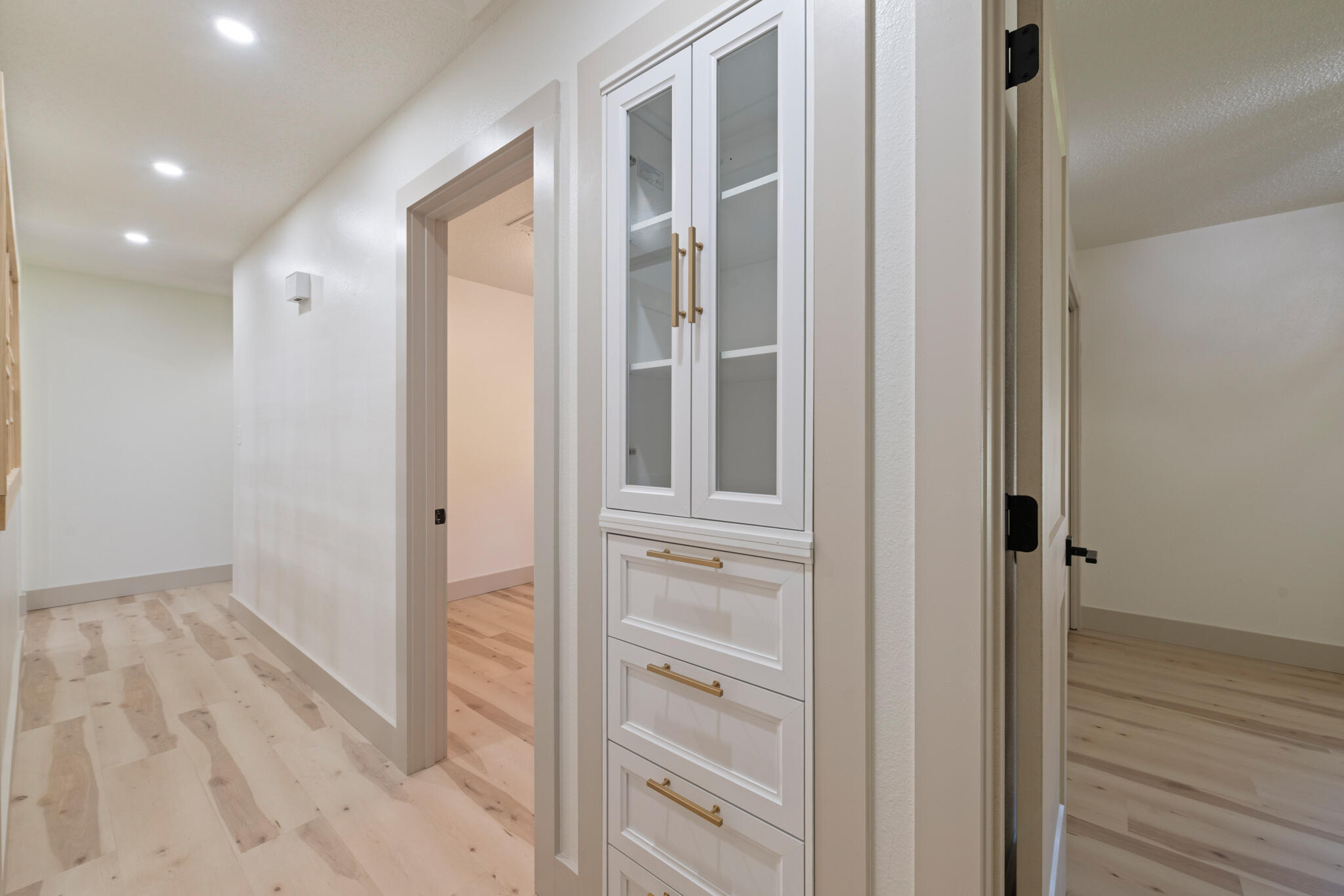 538 22nd Street Niceville, FL 32578 - Photo 24 of 46 a view of a hallway with wooden floor and closet area