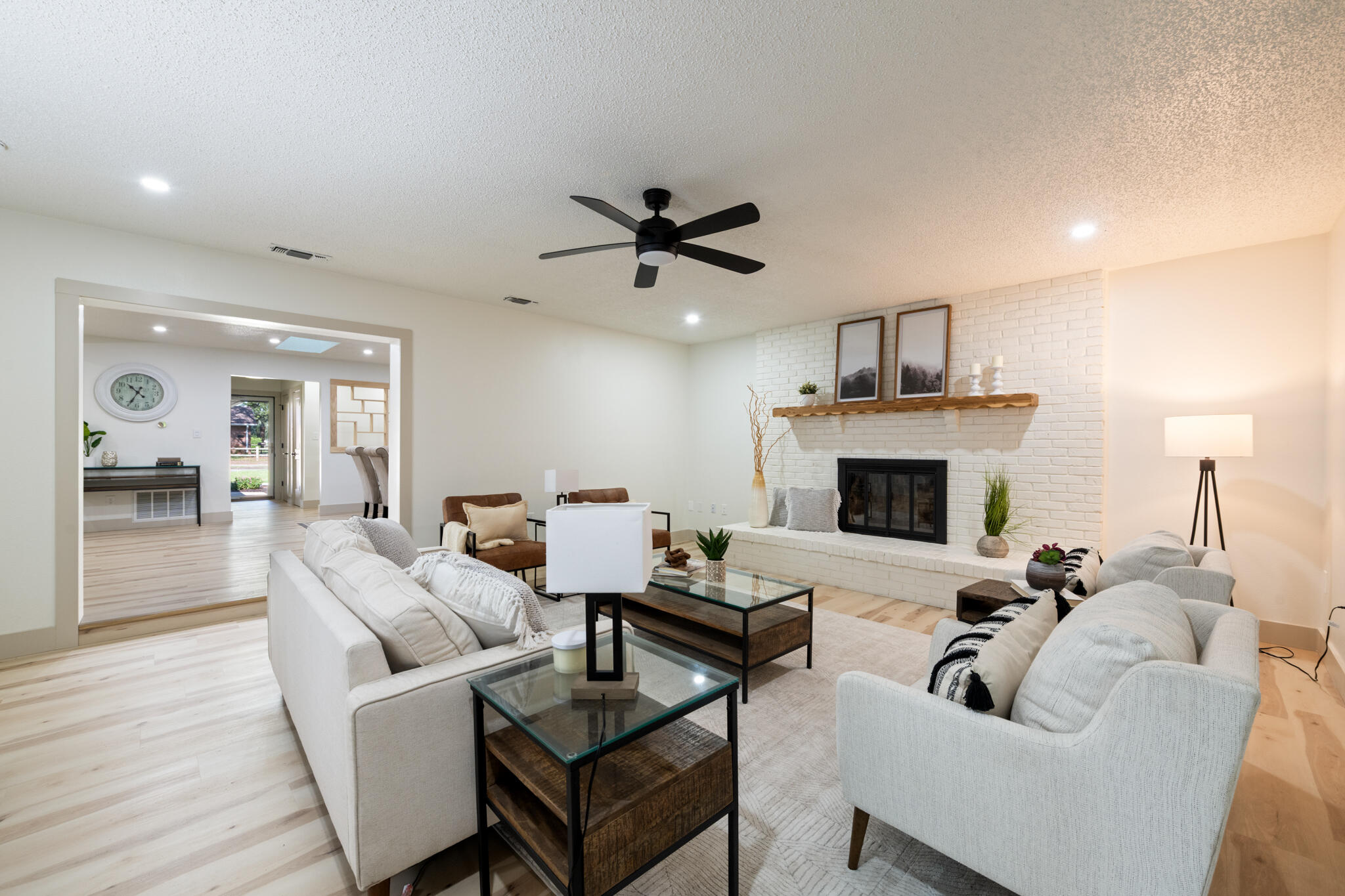 538 22nd Street Niceville, FL 32578 - Photo 34 of 46 a living room with furniture a fireplace and a chandelier