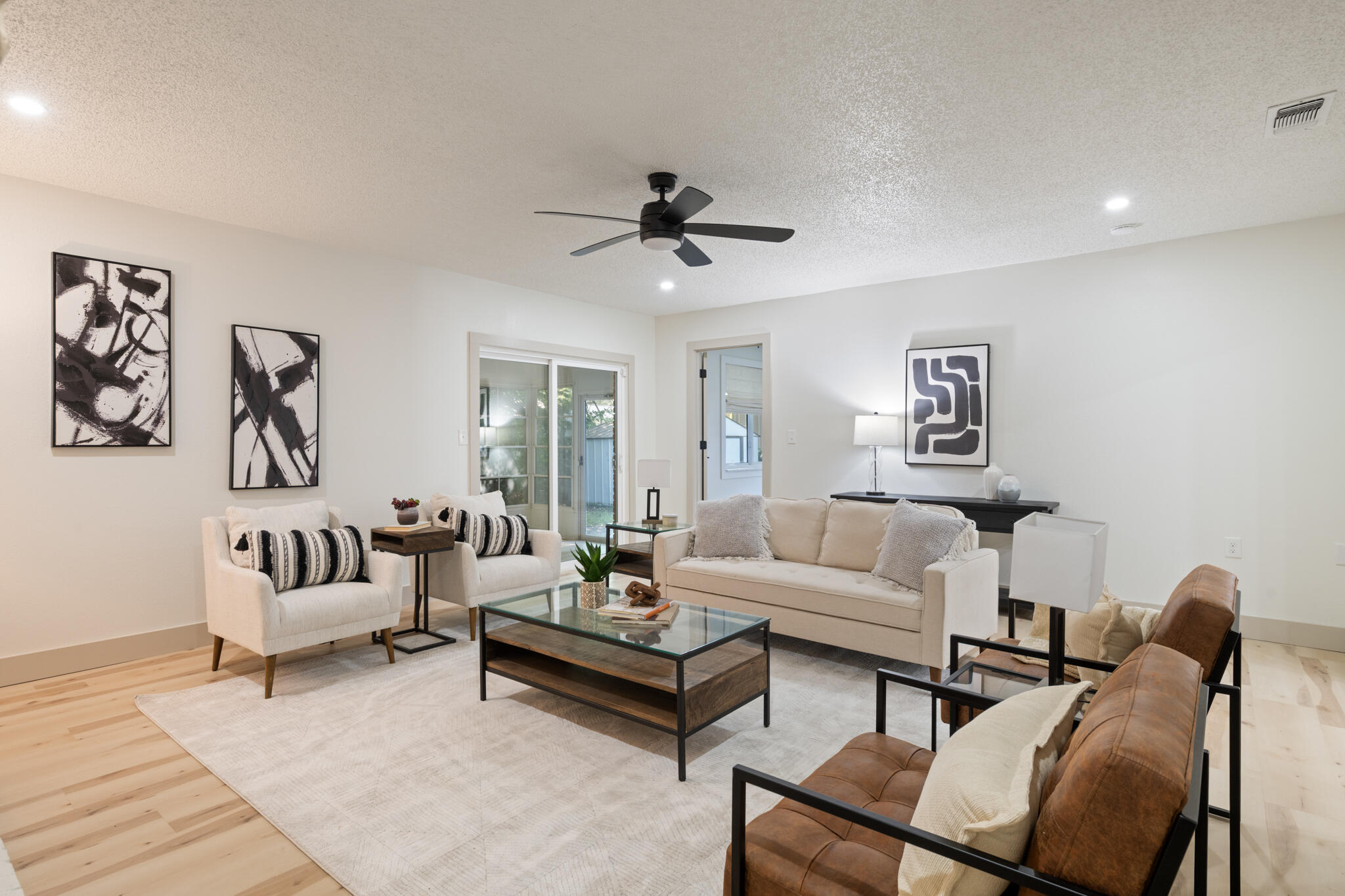 538 22nd Street Niceville, FL 32578 - Photo 35 of 46 a living room with furniture and a chandelier