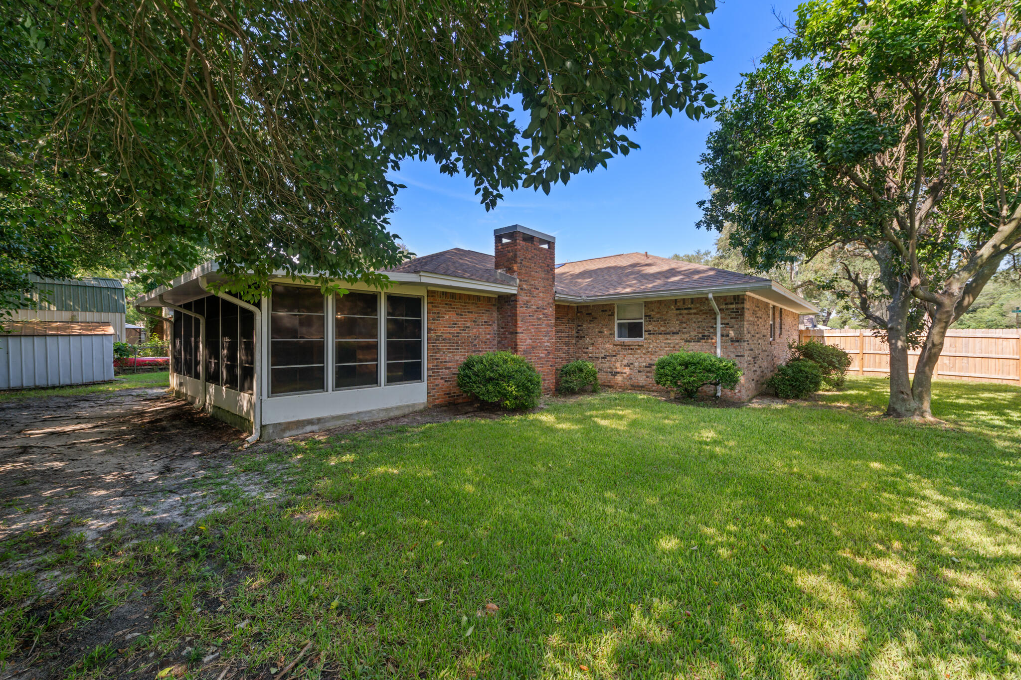 538 22nd Street Niceville, FL 32578 - Photo 42 of 46 a front view of a house with a yard