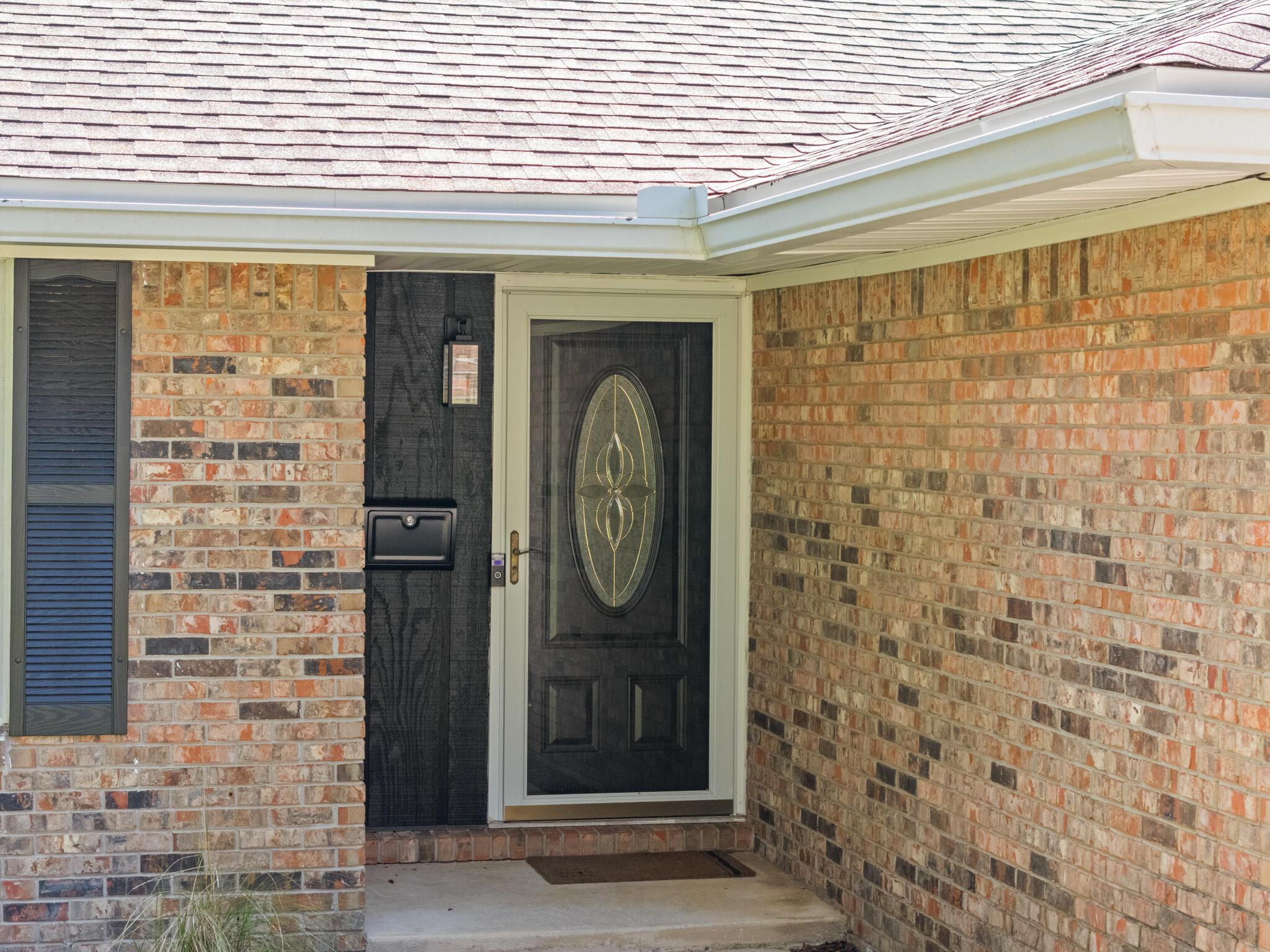 538 22nd Street Niceville, FL 32578 - Photo 6 of 46 a front view of a house with a glass door