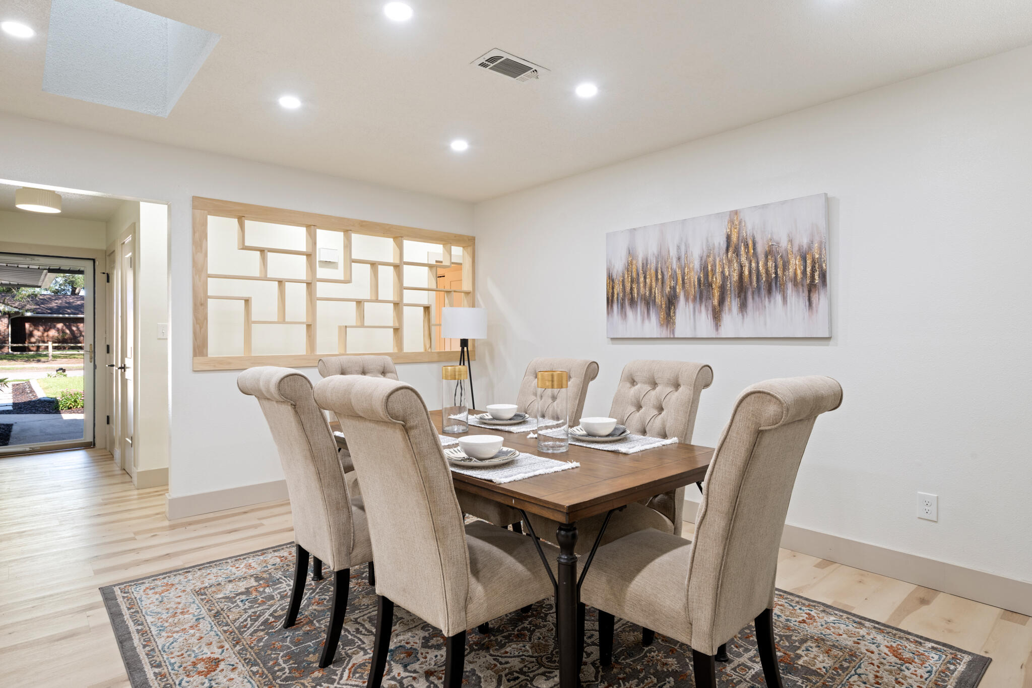 538 22nd Street Niceville, FL 32578 - Photo 9 of 46 a view of a dining room with furniture window and wooden floor